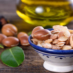 Close up of Argan fruits, kernels, seeds and oils.  Photo by Luisa Puccini