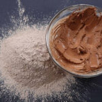 Picture of raw fresh pink Amazon Forest Pink Clay with bowl of wet clay for facial mask.