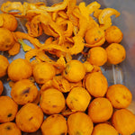 Peeled Tucuma (Astrocaryum Vulgare) fruits - bright orange and full of vitamins and nutrients - from the Amazon Brazil.  Photo by Guentermanaus